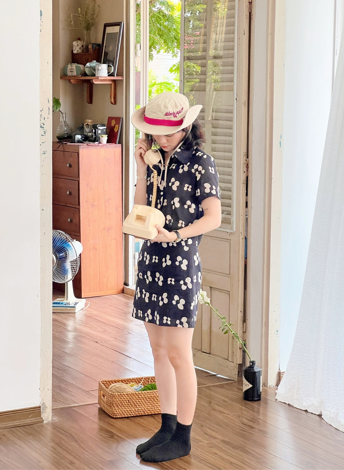 Black and white floral mini skirt made from silk linen.