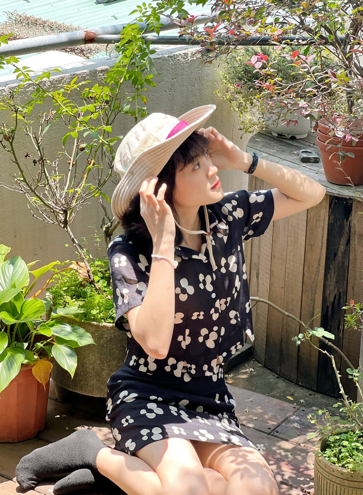 Black and white floral mini skirt made from silk linen.